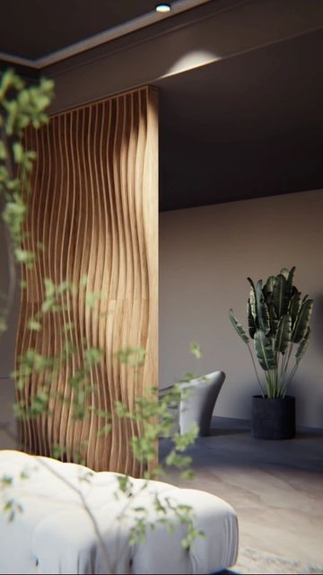 Claustra design en bois sculpté pour structurer un séjour élégant