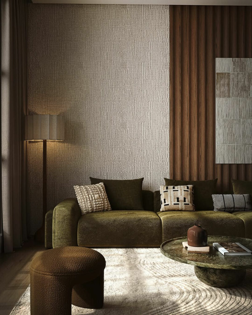 Canapé en velours côtelé vert profond dans un salon élégant avec table basse en marbre